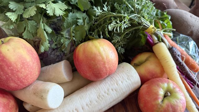 Variety of produce on kitchen table.