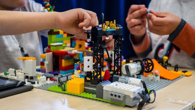 Children participating in lego robotics