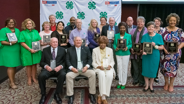 Several award recipients posed for a group photo at the annual NC 4-H Adult and Alumni Awards.