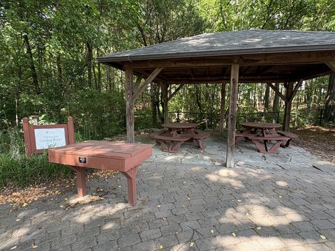 open air shelter with picnic tables