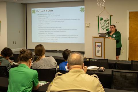Cecilia Tadt giving a presentation on New Hanover 4-H Program.