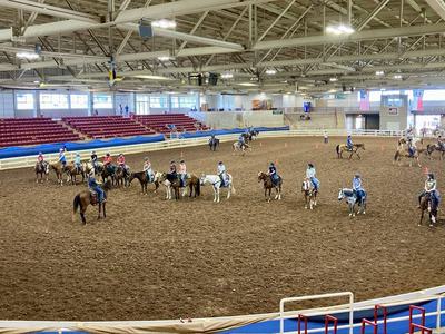 Youth riding horses at the West District 4-H Horsemanship Clinic.