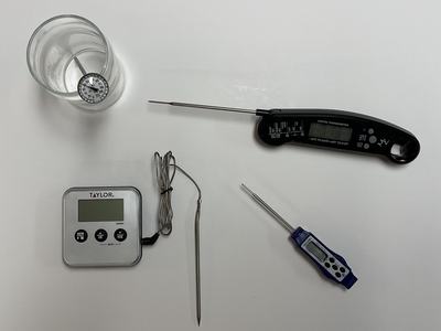 Silver oven cord thermometer, thermistor, thermocouple, and bimetal cooking thermometers.
