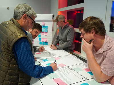 EFM Group collaborating around a table