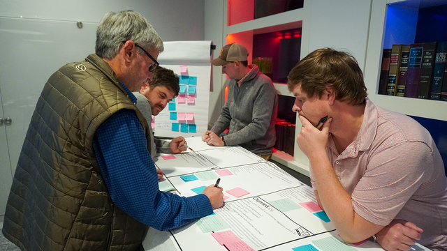 EFM Group collaborating around a table