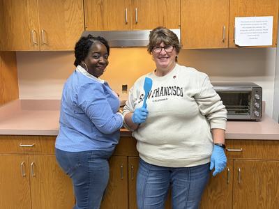 Lynnell and Cindy making a recipe