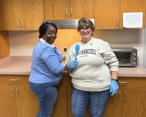 Lynnell and Cindy making a recipe
