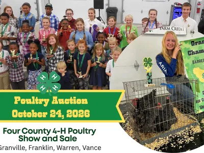 group of 4-H youth, chickens in a cage with girl holding grand champion banner