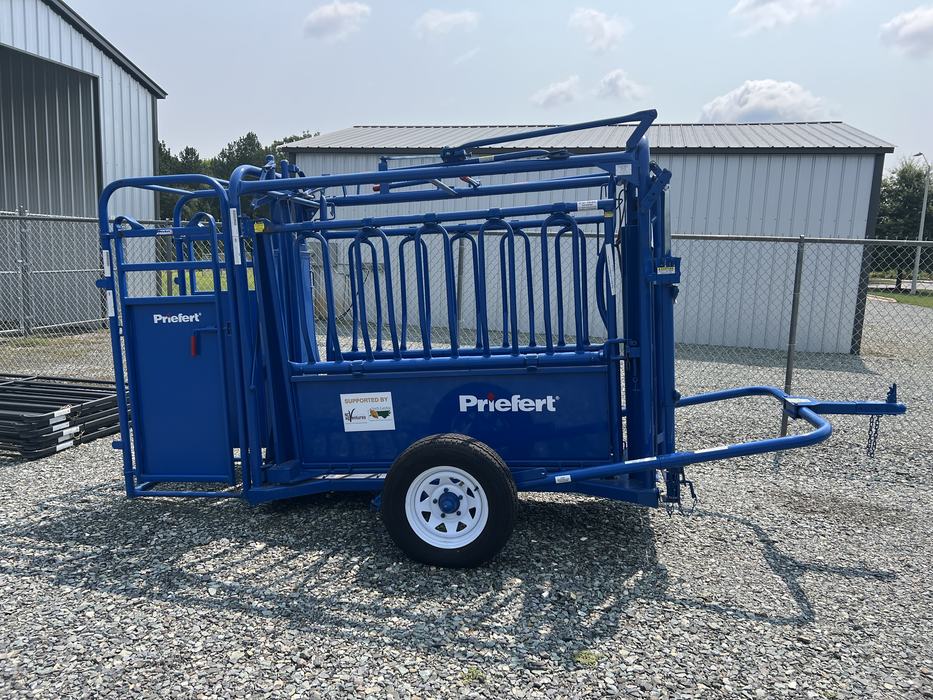 Blue Cattle Squeeze Chute with Palpation Cage on Wheels
