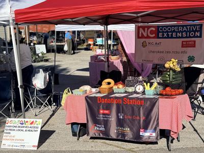 Donation Station at the Murphy Farmers Market with vegetable donations.