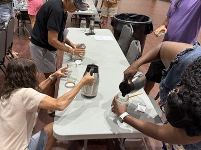 Class participants make their own kombucha.