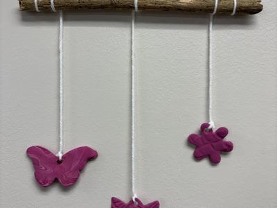 Wall hanging of hand-made air-dry clay charms