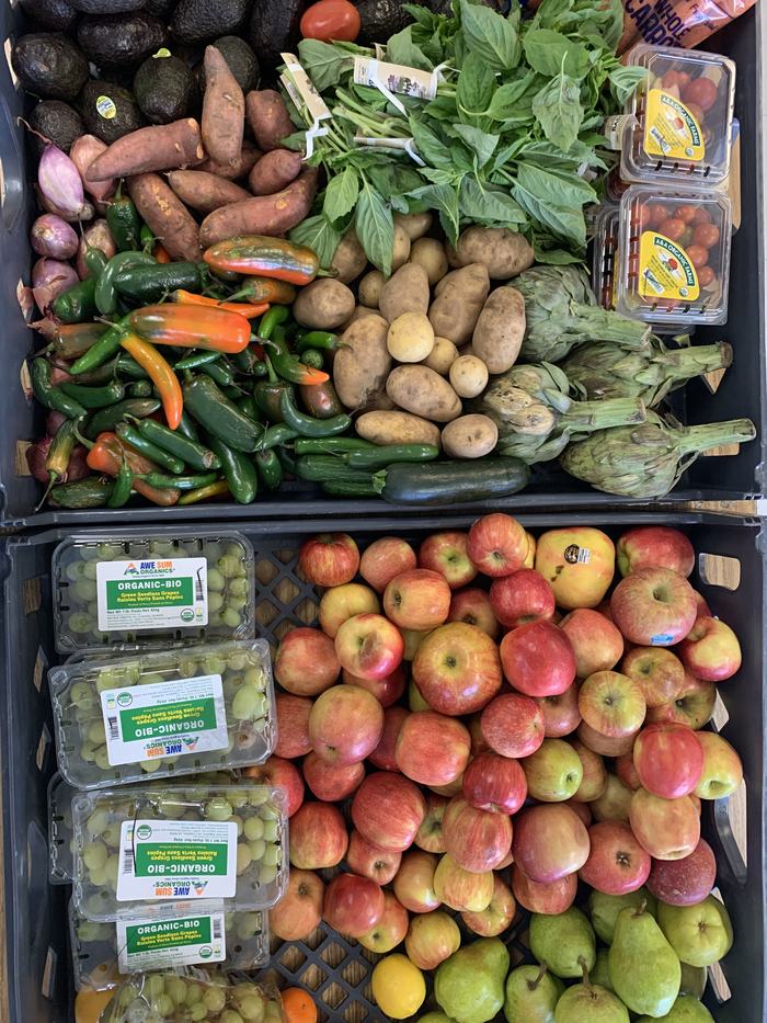 Baskets of various fruits and vegetables