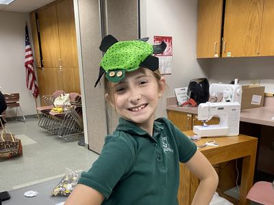 girl with turtle mop on head