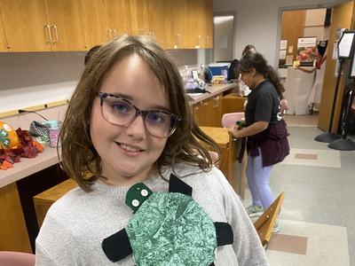 girl with turtle mop