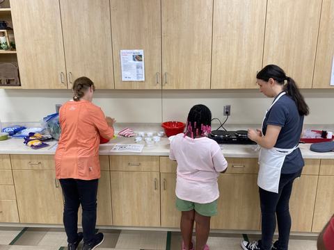 EFNEP Youth program, making a recipe in the kitchen.