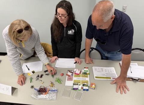 master gardener class attendees learning about insects