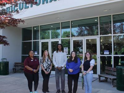 Union County Cooperative Extension staff and summer interns pose for a group photo outside the Union County Agricultural Center.