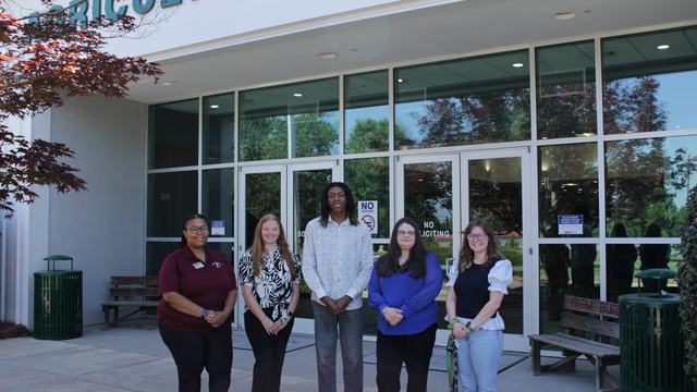 Union County Cooperative Extension staff and summer interns pose for a group photo outside the Union County Agricultural Center.