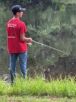 Boy fishing.