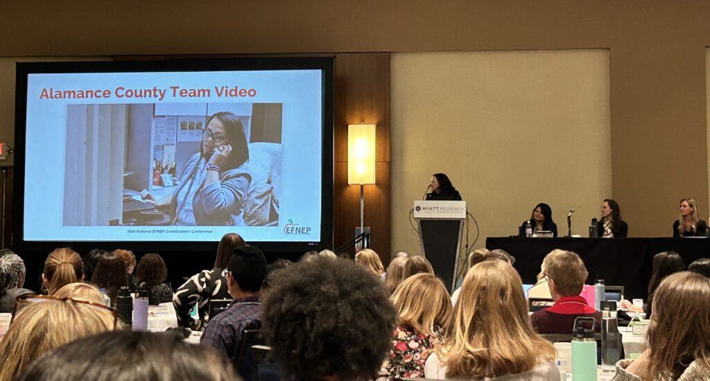 Staff presenting at conference 