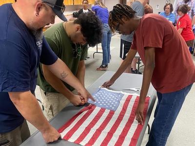 youth working with stars for our troops