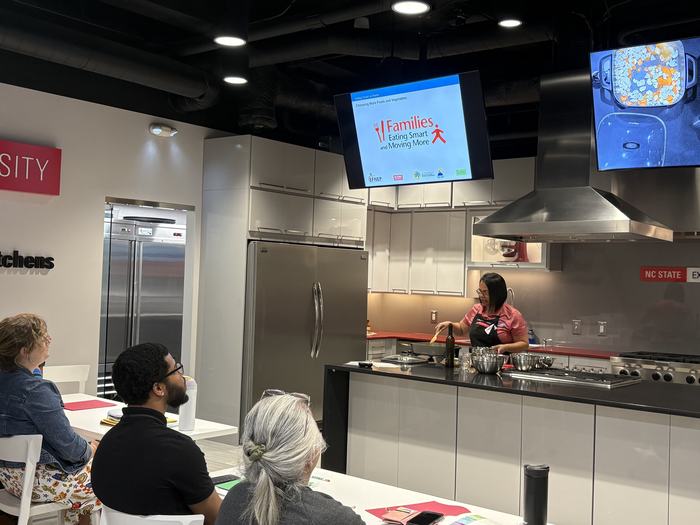 Patty Holmes leading a cooking demonstration