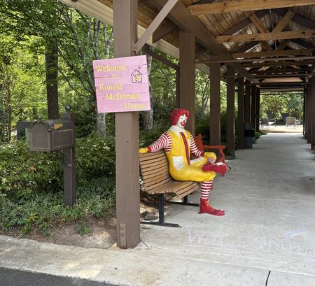 Ronald McDonald on a bench