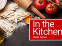 In the Kitchen Cover Photo shows the words in the kitchen over a pasta making black backdrop with eggs and pasta.