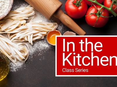 In the Kitchen Cover Photo shows the words in the kitchen over a pasta making black backdrop with eggs and pasta.