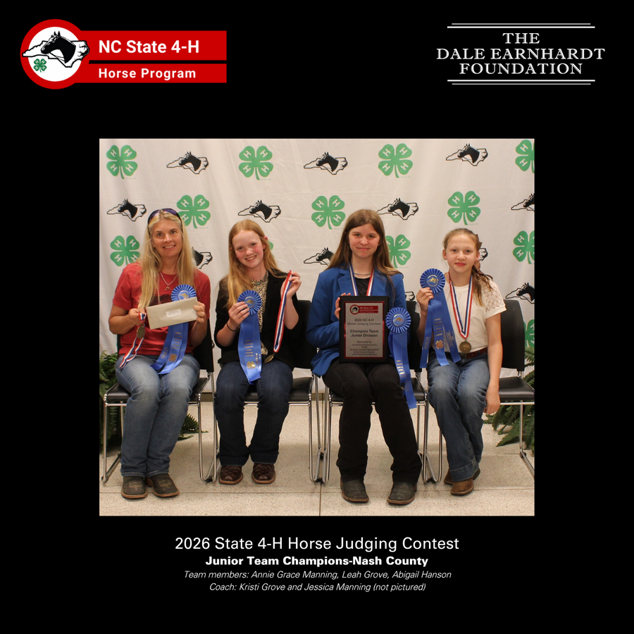 2026 Junior  Horse Judging Champion team award recipients with their ribbons in front of the NC 4-H Horse Program picture backdrop.