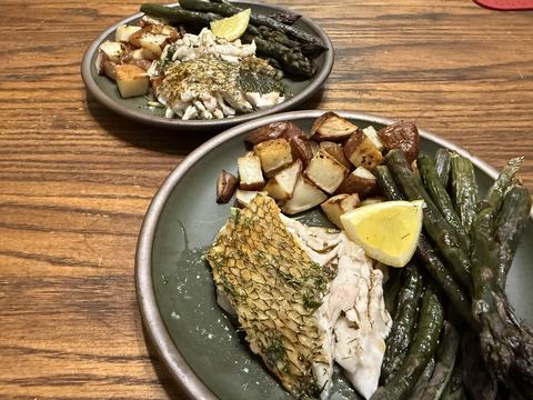 Plate with fish, potatoes, and asparagus.
