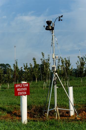 Weather station in apple orchard