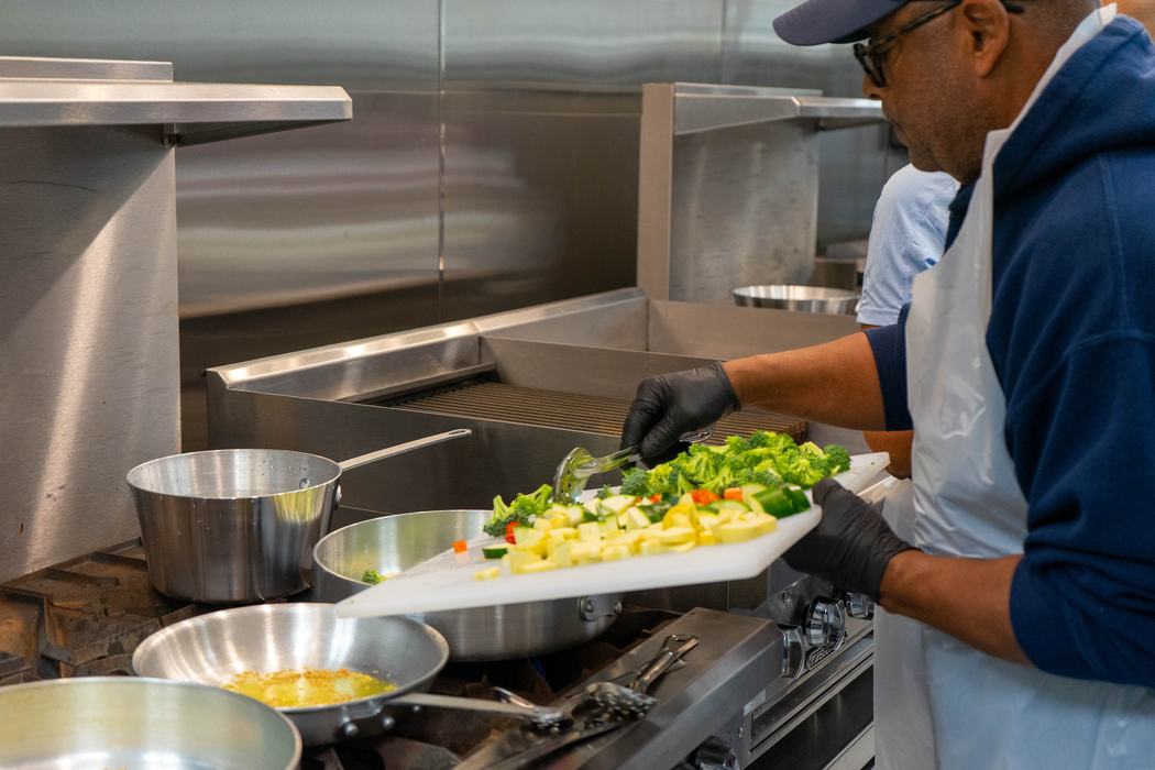Med Instead of Meds Participant Cooking Veggies