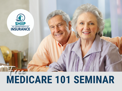 Older couple at computer desk smiling for camera