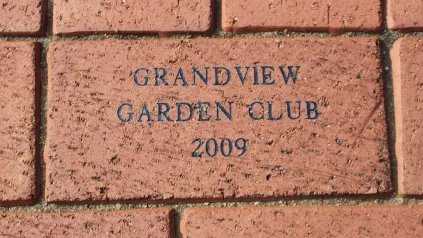 Engraved memorial brick example.