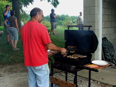 Person grilling food