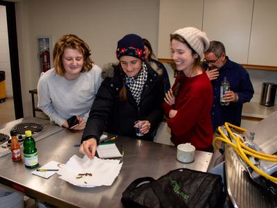 People eating corn earworms