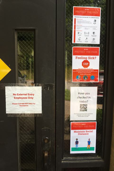 Signs on door of building