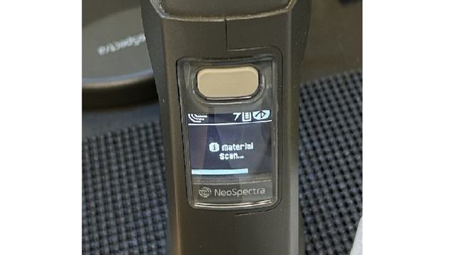 Image of a near-infrared device scanning a sample.