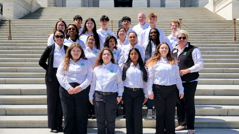 North Carolina 4-H youth and adult leaders gather for a group photo on the steps of the U.S. Capitol while attending National 4-H Conference.