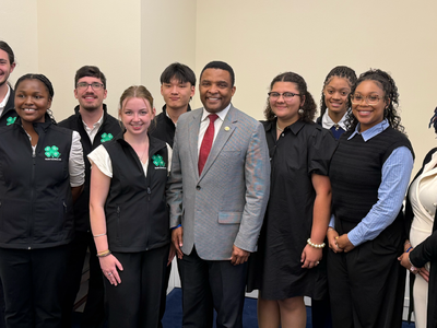 North Carolina 4-H youth delegation posing with a U.S. Representative during a visit to the U.S. Capitol at National 4-H Conference.
