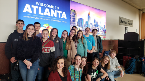 North Carolina 4-H youth pose together at Hartsfield-Jackson Atlanta International Airport during travel for National 4-H Congress.