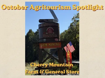 Welcome sign from street view of Cherry Mountain Farm and General Store.