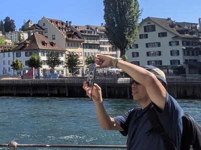 A man taking a photo with his smartphone