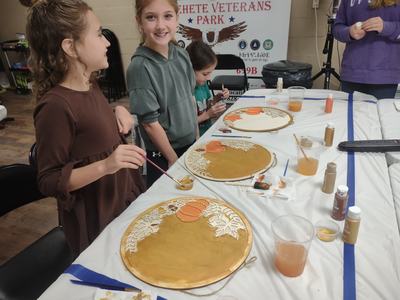 Girls painting.