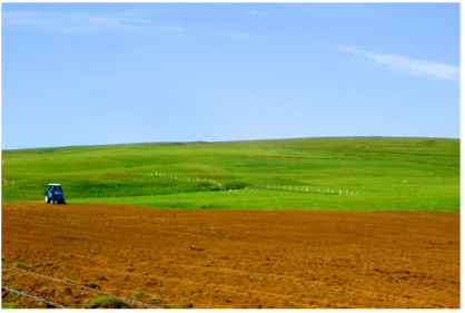 Picture of tractor in open field
