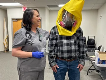 nurse providing a FIT test on one our pesticide applicators