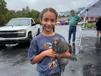 4-H Poultry Show Participant with her bird
