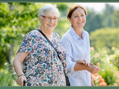 Older Adult and Caregiver Walking